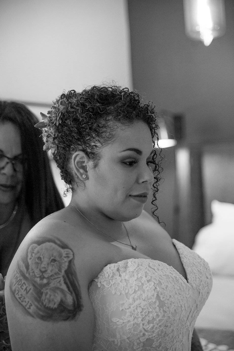 Bride looking the mirror before the ceremony at Roblar Winery in Santa Ynez, CA 